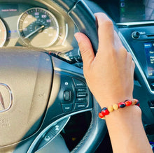 Load image into Gallery viewer, Handcrafted Bracelet with Palo Santo and Huayruro Seeds | Made from Ethically Sourced Palo Santo and Authentic Huayruro Seeds | Symbolizes Good Luck, Protection, and Positive Energy
