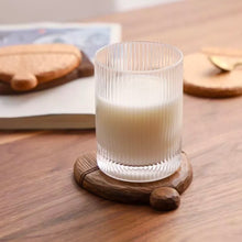 Load image into Gallery viewer, Walnut Hand-carved Winter Coaster Set
