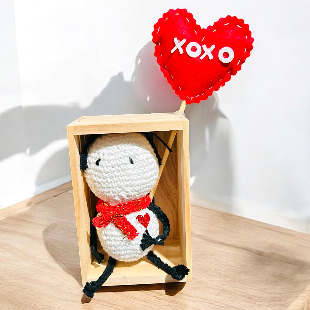 White crochet figurie with red felt XOXO heart in wooden frame