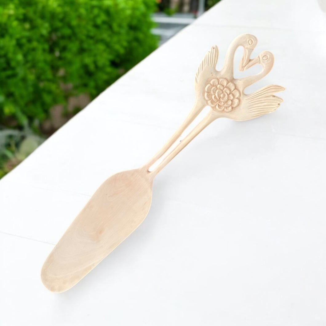 Beautiful Hand Carved Wooden Cake
Knife - Eco-Friendly Unka Wood Slice for Serving